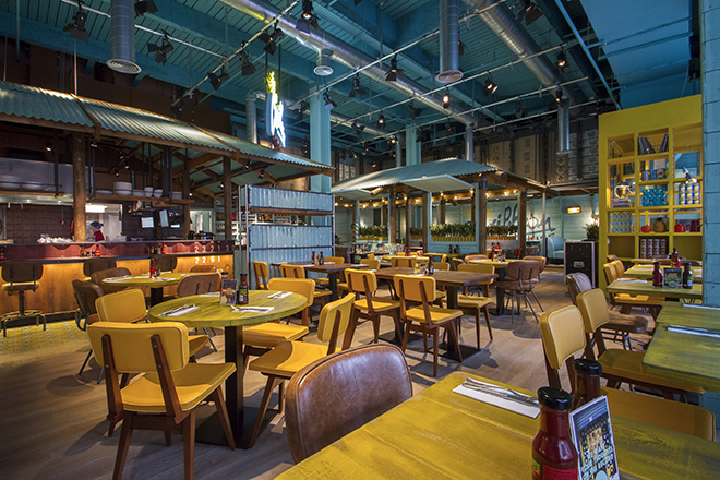 Caribbean Smokehouse opens with retro-vibe interiors by B3 Designers