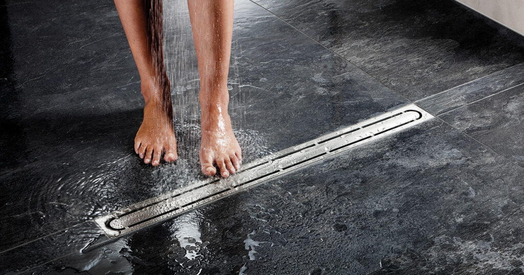 Compliant, low-height bathroom/wetroom drain